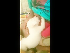 Woman Breastfeeding a Puppy 23
